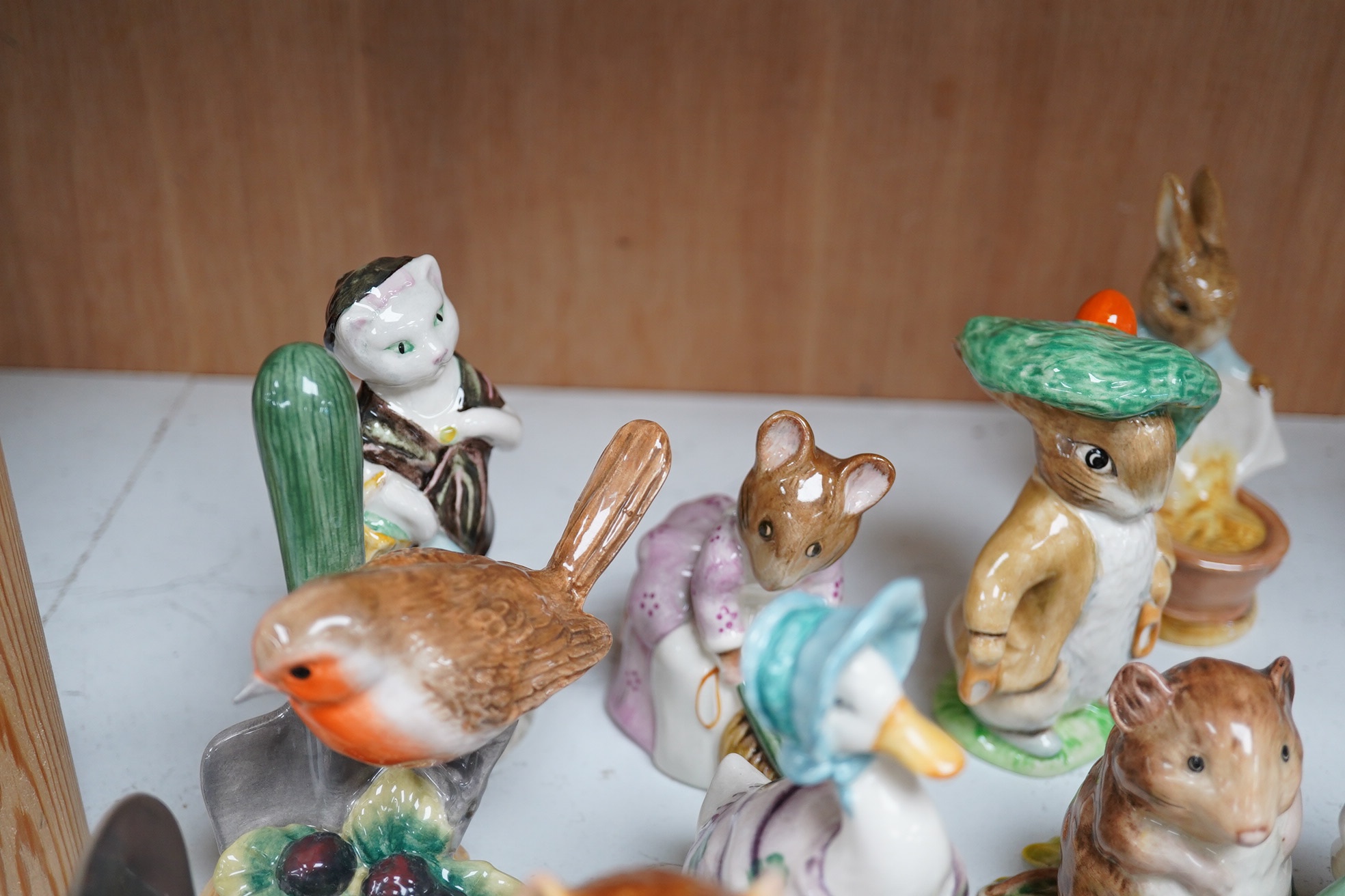 A collection Beswick ‘Bunnykins’ characters and two Royal Copenhagen ornaments (15). Tallest 13cm. Condition - good